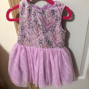 Fancy sequined dress. Bloomers.
